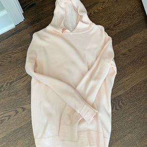 Long knit sweater with a hood